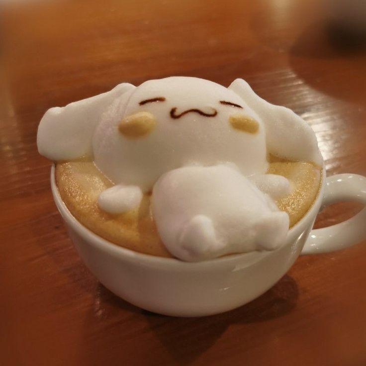 A cinnamoroll shaped milk foam on top of a coffee cup, laying peacefully